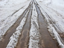 country-road-covered-dirty-melting-snow-puddles-early-spring-30262065